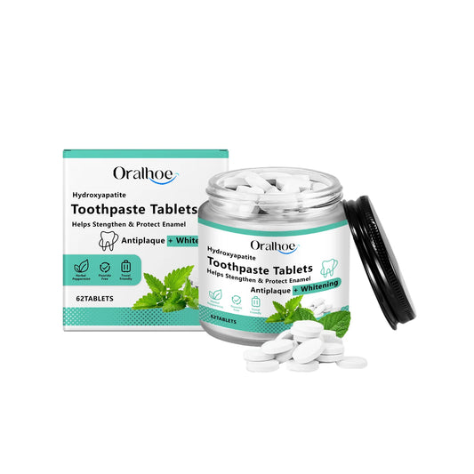 Oralhoe hydroxyapatite toothpaste tablets box and jar with white tablets and mint leaves